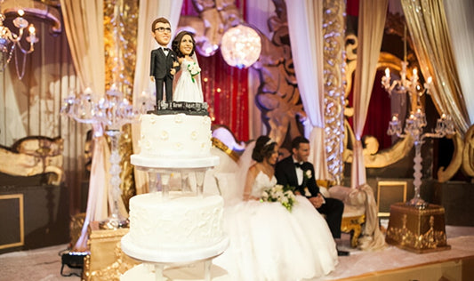 bobblehead doll on wedding cake